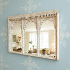 mango wood mirror, jharokha mirror, triple arch mirror, carved mirror, rustic white mirror, distressed mirror, indian mirror, arched mirror, wall mirror, statement mirror, palace mirror, scalloped arches, floral spandrels, fluted pilasters, bracketed cornice, vintage inspired, farmhouse boho, global eclectic, handcrafted in india, artisan made, solid wood frame, large wall mirror, console mirror, buffet mirror, living room mirror, entryway mirror, dining room mirror, architectural mirror, heirloom quality, 