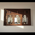 mango wood mirror, carved mirror, jharokha mirror, triple arch mirror, rajasthani mirror, indian mirror, vintage mirror, rustic mirror, antique mirror, distressed mirror, horizontal mirror, wall mirror, statement mirror, architectural mirror, palace mirror, traditional mirror, handmade mirror, artisan mirror, premium mirror, quality mirror, durable mirror, elegant mirror, unique mirror, decorative mirror, focal piece mirror, handcrafted in india, sustainable mango wood, rustic antique, antique finish, multi