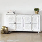 hand carved sideboard, mango wood sideboard, all white sideboard, white sideboard, floral carved sideboard, openwork sideboard, 4 door sideboard, 4 drawer sideboard, buffet sideboard, indian carved furniture, storage sideboard, dining room buffet, living room sideboard, entryway sideboard, statement sideboard, large sideboard, handmade sideboard, artisan made sideboard, premium wood buffet, quality wood furniture, durable sideboard, sturdy buffet, timeless sideboard, elegant buffet, grand sideboard, heirloo