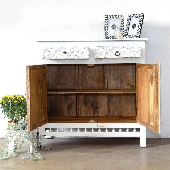 hand carved cabinet, mango wood cabinet, white cabinet, 2 door cabinet, 2 drawer cabinet, lotus carved cabinet, medallion carved cabinet, indian carved furniture, storage cabinet, dining room cabinet, living room cabinet, bedroom cabinet, entryway cabinet, sideboard cabinet, accent cabinet, handmade cabinet, artisan made cabinet, premium wood cabinet, quality wood furniture, durable cabinet, sturdy cabinet, timeless cabinet, elegant cabinet, statement cabinet, heirloom cabinet, coastal cabinet, shabby chic 