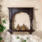 Jodhpur hand-carved dark wood archway pooja shelf with columns and corbels. Handcrafted in Jodhpur, Rajasthan. Ideal for pooja display and antique home decor.