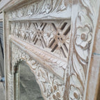 hand carved mirror, solid wood mirror, rustic white mirror, distressed white mirror, horizontal mirror, wall mirror, mehrab arch mirror, arched mirror, jali lattice mirror, entryway mirror, console mirror, living room mirror, bedroom mirror, decorative mirror, indian furniture, handmade mirror, artisan made mirror, premium wood mirror, quality mirror, durable mirror, sturdy mirror, timeless mirror, elegant mirror, statement mirror, ornate mirror, unique mirror, sculptural mirror, focal piece mirror, handcra
