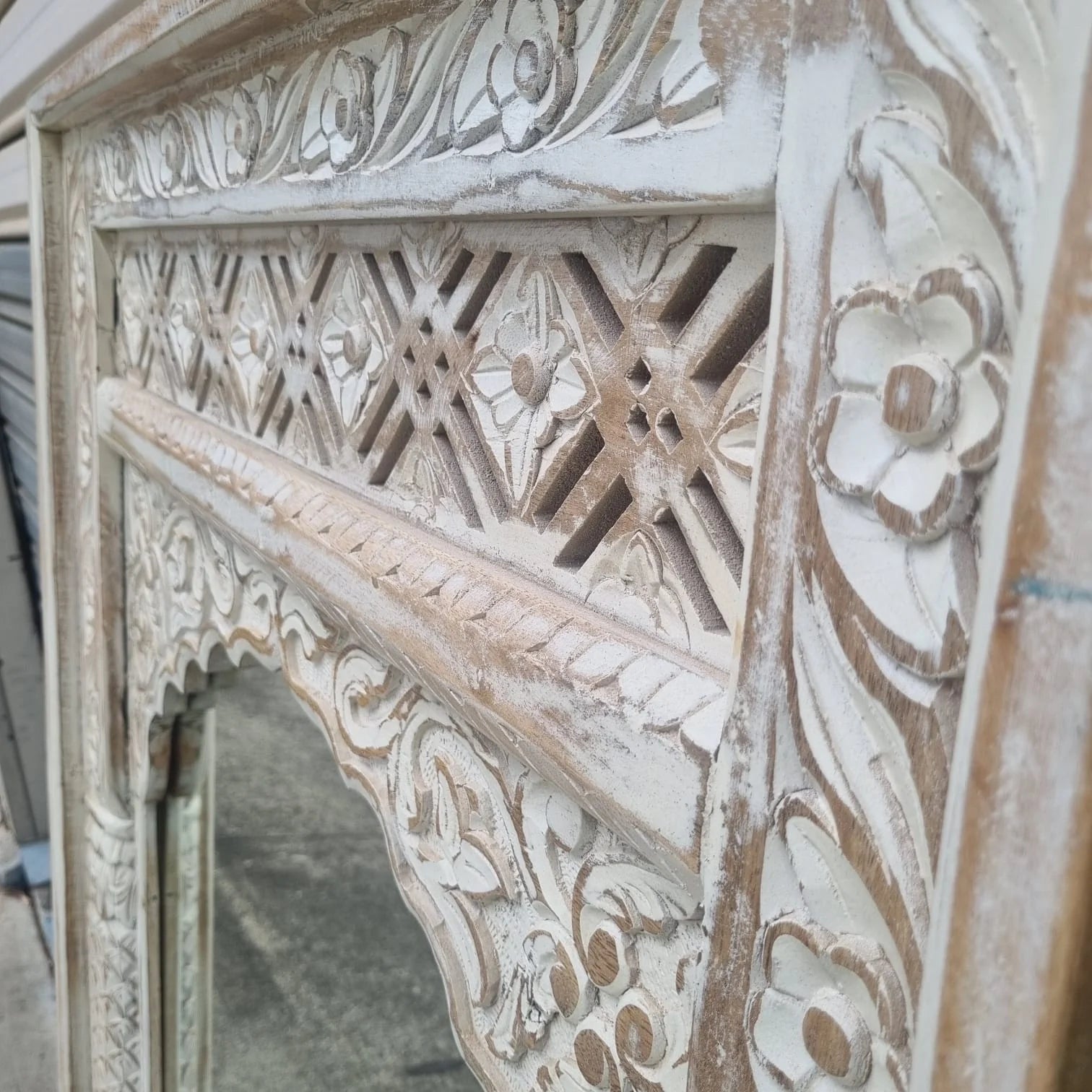 hand carved mirror, solid wood mirror, rustic white mirror, distressed white mirror, horizontal mirror, wall mirror, mehrab arch mirror, arched mirror, jali lattice mirror, entryway mirror, console mirror, living room mirror, bedroom mirror, decorative mirror, indian furniture, handmade mirror, artisan made mirror, premium wood mirror, quality mirror, durable mirror, sturdy mirror, timeless mirror, elegant mirror, statement mirror, ornate mirror, unique mirror, sculptural mirror, focal piece mirror, handcra