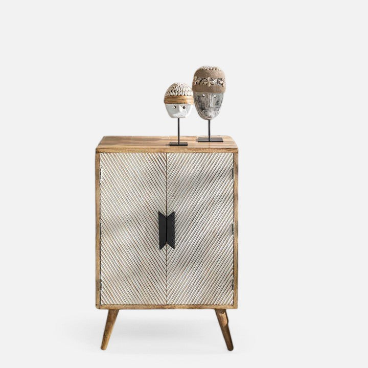 Compact bedroom cabinet for clothing and essentials.
